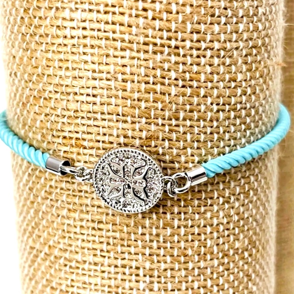 NWOT- Rustic Cuff- Sparkling Medallion Charm Bracelet with Light Blue Cord.